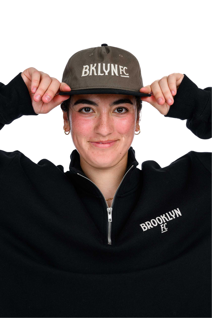 Brooklyn FC Wordmark Hat in two-toned black and brown, featuring the iconic Brooklyn FC logo and an adjustable strap for a comfortable fit.
