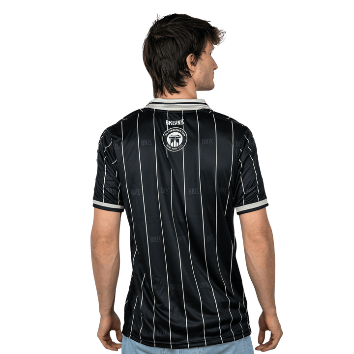 Shop the Brooklyn FC Home Jersey for men. Featuring breathable, moisture-wicking fabric, official team crest, and sponsor branding for authentic match-day style. Back View 2.