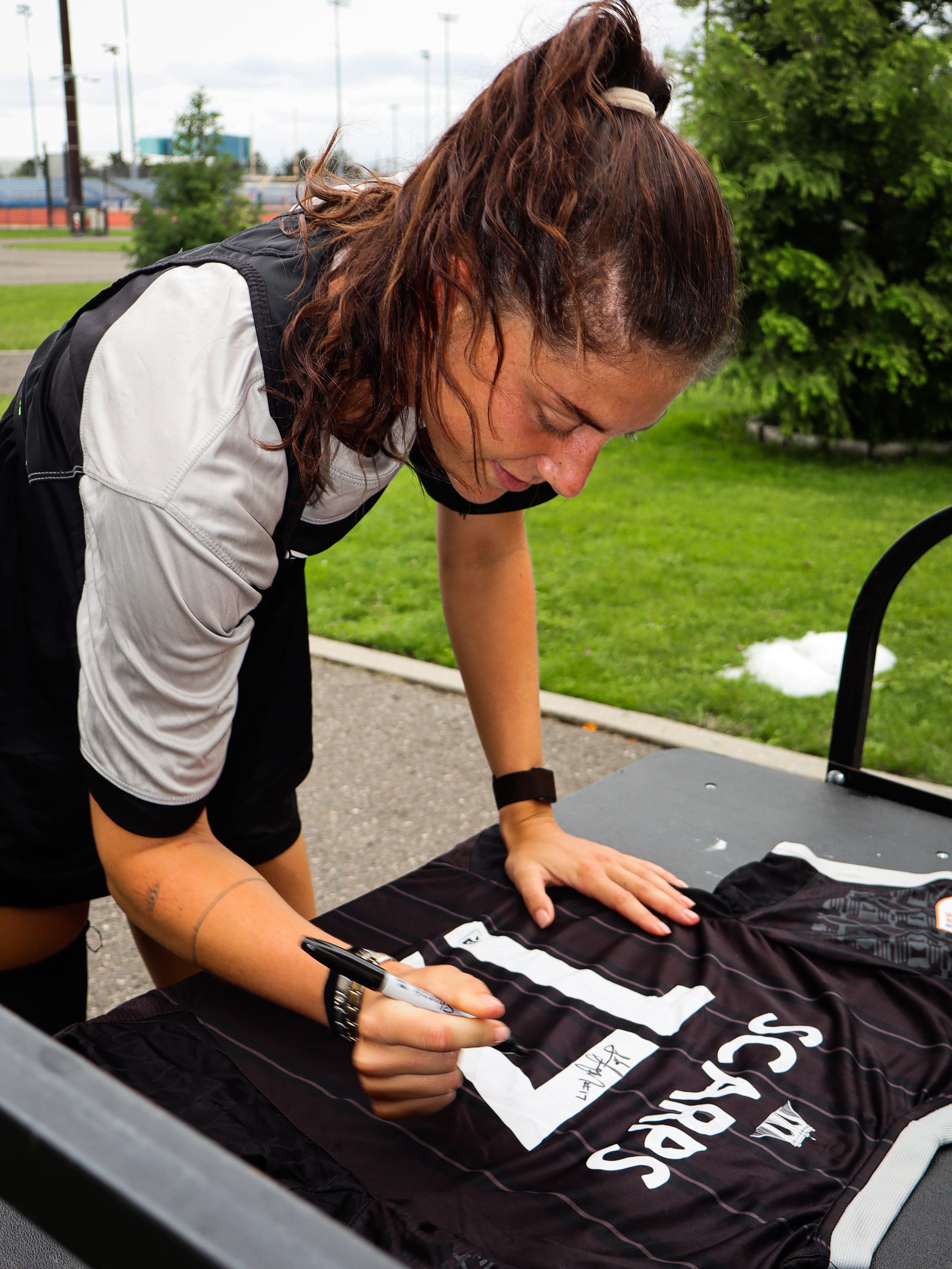 Leah Scarpelli (Scarps) Signed Jersey - Leah signing 2