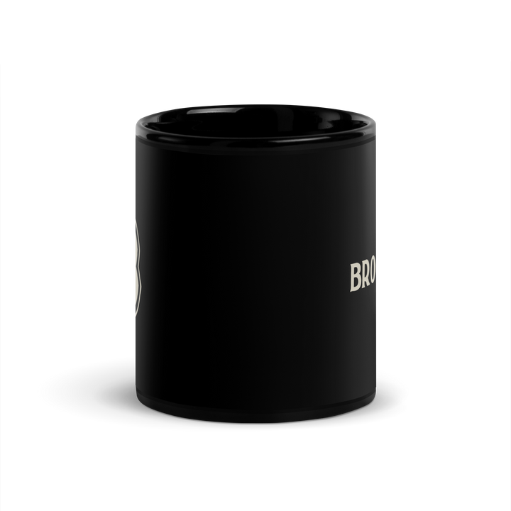 Black ceramic Brooklyn FC coffee mug with official wordmark in bold white lettering.