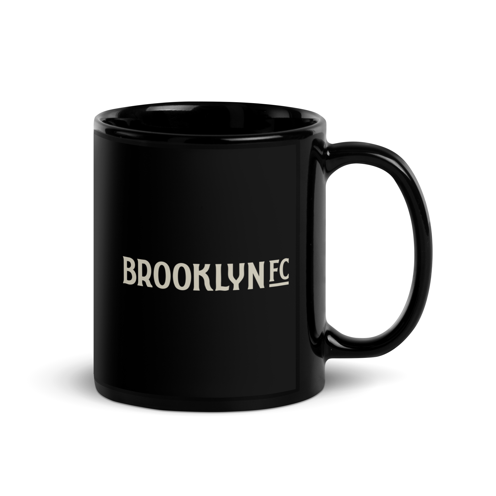 Black ceramic Brooklyn FC coffee mug with official wordmark in bold white lettering.