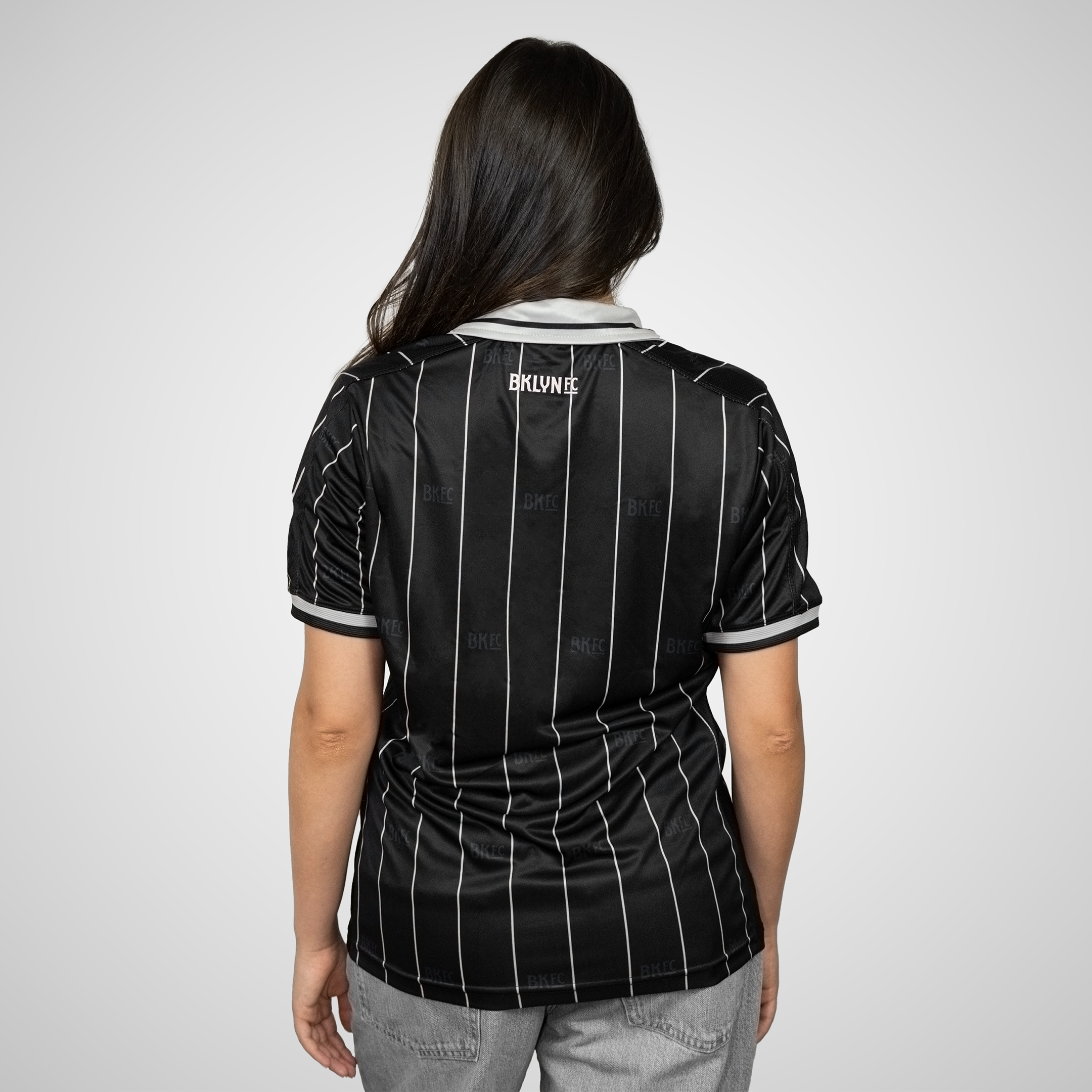 Brooklyn FC Women's Home Jersey featuring breathable, moisture-wicking fabric and official team crest for a comfortable, stylish fit. Back View.