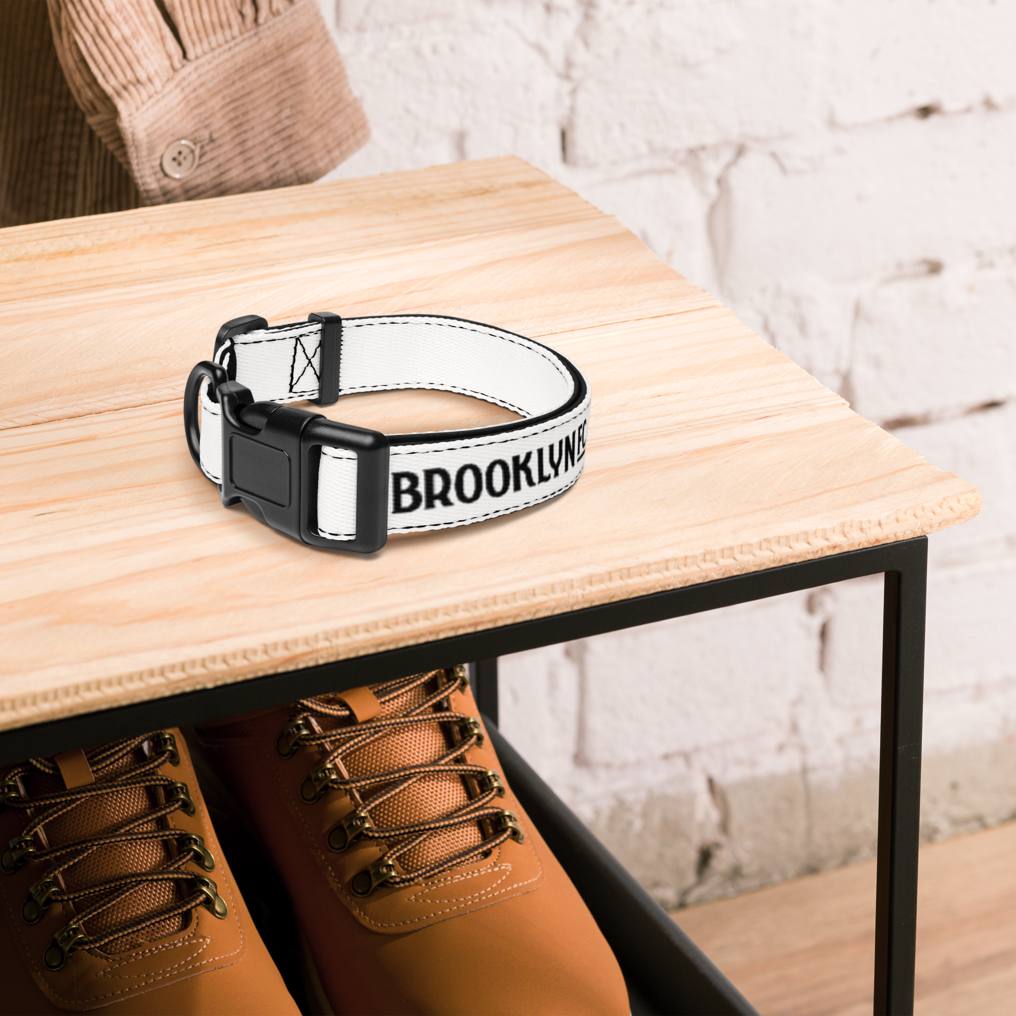 Brooklyn FC embroidered pet collar in blue-and-black polyester webbing with spandex lining, sponge padding, and black quick-release buckle.